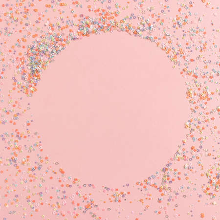 Round border frame made of colorful little stars