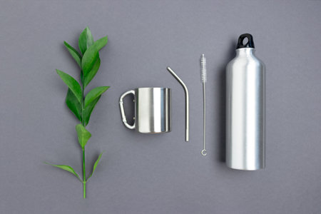 Metal bottle, mug, tube and cleaning brush. Zero waste flatlay.の写真素材