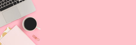 Banner with coffee, office supplies and laptop on a pink background. E-learning, distance work concept with copy space. Business workspace.の写真素材