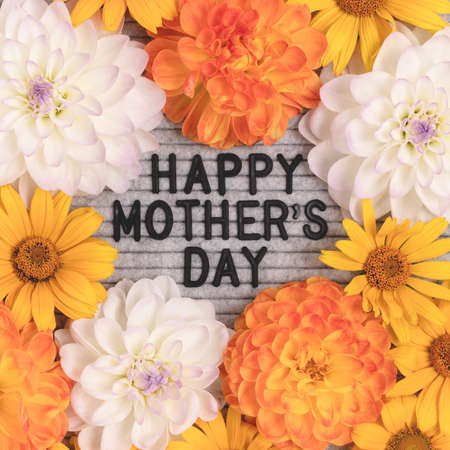 Happy Mothers day. Letter board with texture made of dahlia flowers. Festive floral composition.の写真素材