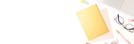Banner with laptop and stationery on a white background. Workspace for homeschooling with place for...