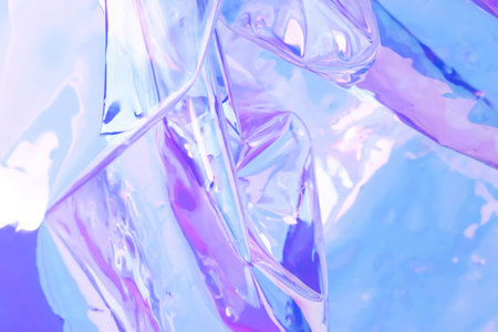 Blurred monochrome holographic background. Defocused texture of wrinkled foil in purple colors.