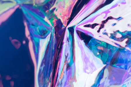 Colorful blurred holographic background. Defocused futuristic texture.の写真素材