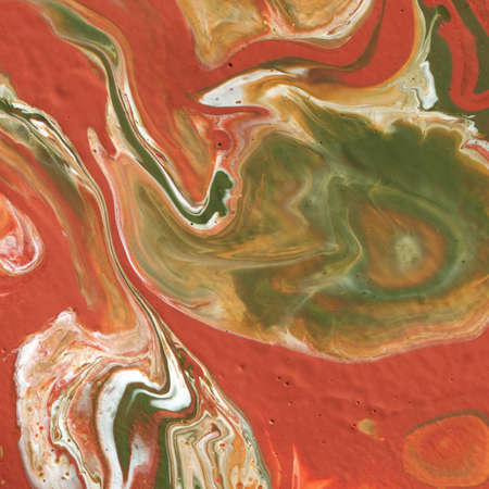 Acrylic texture made in fluid pour technique. Background in red and green colors.