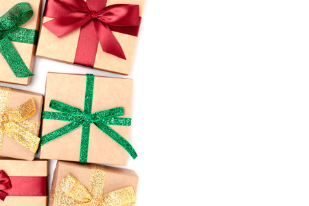 Wrapped gifts with ribbons on a white background. Boxing day concept with copy space.