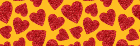 Banner with pattern made of red glittering hearts. Creative holiday background.