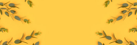Banner with frame made of eucalyptus branches on a yellow background. selective focus. Place for...