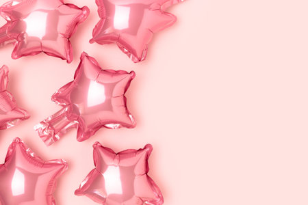 Frame made of pink pastel star balloons. Baby shower concept with copy space.の写真素材