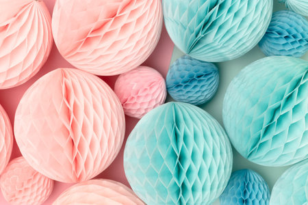 Tissue paper balls in pink and blue colors. Gender reveal party concept. Creative holiday background.の写真素材