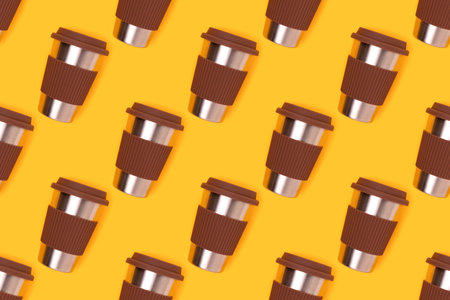 Repetitive pattern made of reusable coffee cup on a yellow background. take away drinks composition.