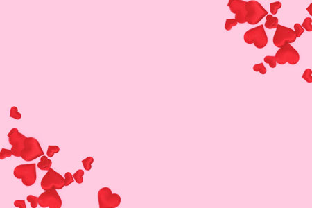 Frame made of red textile hearts confetti scattered on a pink background.の写真素材