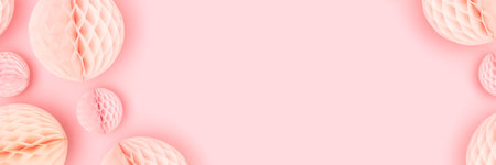 Banner with tissue paper balls scattered on a pink background. creative layout.