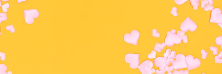 Banner with pink textile hearts confetti on a yellow background.