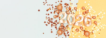 Banner with New 2026 Year festive concept. Metallic golden numbers and glittering confetti.