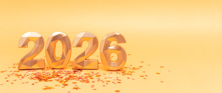 2026 - golden numbers and confetti. Glittering New Year monochrome concept with place for text.の写真素材