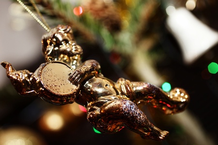 angel christmas decorations at christmas treeの写真素材