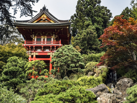 Japanese Tea Garden, Golden Gate Park, San Francisco, California, CA, USA - Buddhist Pagoda in red colour within the green zen garden. 75 Hagiwara Tea Garden Drive, San Francisco's Golden Gate Park, San Francisco, California, CA, USAのeditorial素材