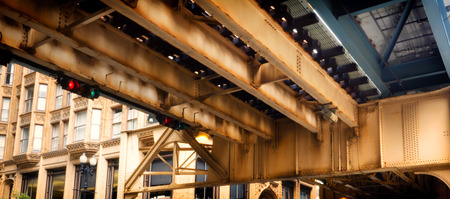 Elevated Train Tracks above the streets and between buildings at The Loop - Chicago, Illinois, USA