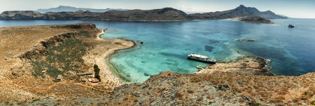 Panorama: Balos Lagoon Turquoise and Blue sea, view from the cliff of the island fort, Crete Island, Greeceの写真素材