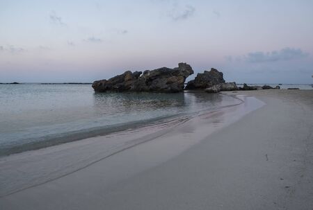 Pink sand and turquoise water early in the morning at Elafonisi Lagoon, Crete Island, Greeceの写真素材