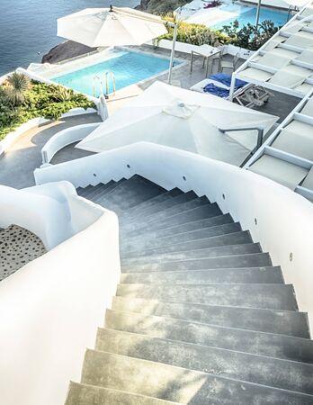 Santorini curly stars and swimming pool, Greeceの写真素材