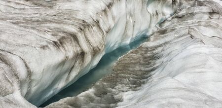 Franz Josef Glacier crampons hike through the blue glacier ice - New Zealand, South Island, NZの写真素材