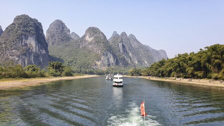 Li River surrounded by Karst between Guilin and Yangshuo - Guangxi Province, Chinaの写真素材