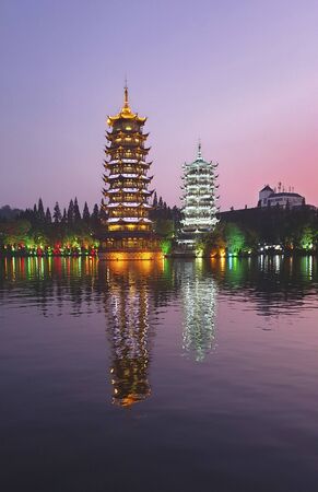 The Sun and Moon Pagodas at the Shanhu Lake, Guilin, Guangxi Province, Chinaの写真素材