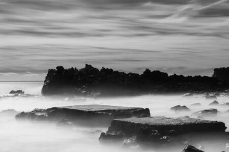 The geometries of the rocks and water in and out of the narrow rocky canals. Long time exposure and silk effect for this picture.の写真素材