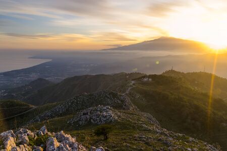 This is the magical view from Mount Veneretta (ME), Sicily, IT. Spectacular scenery including the view from Syracuse until well into the northwest of Sicily as well as the extraordinary view of the harbor of Giardini Naxos, Taormina, Castelmola. Questa Ã¨の写真素材