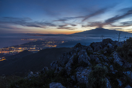 This is the magical view from Mount Veneretta (ME), Sicily, IT. Spectacular scenery including the view from Syracuse until well into the northwest of Sicily as well as the extraordinary view of the harbor of Giardini Naxos, Taormina, Castelmola. Questa Ã¨の写真素材