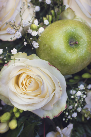 white rose and green appleの写真素材