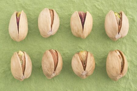 Sicilian pistachio on green backgroundの写真素材