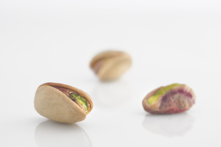 Sicilian pistachio on glossy whiteの写真素材