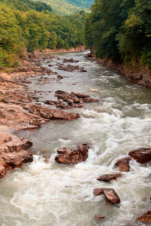 Wild River at the beautiful mountain valleyの写真素材