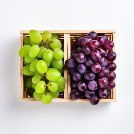 grapes in a wooden box on a white background, top viewの素材