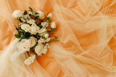 Beautiful calla lilies on wedding dress background, closeupの素材
