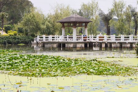the chinese pavilion above a lakeの写真素材