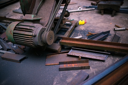cutting machine and steel materials in a workshop
