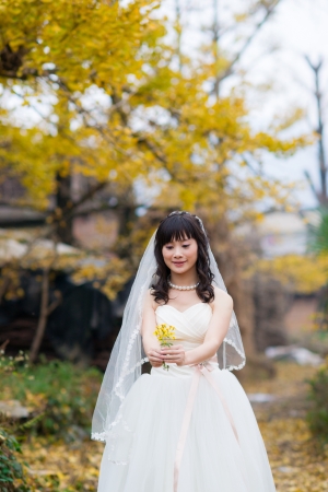happiness bride in ginkgo forestの写真素材