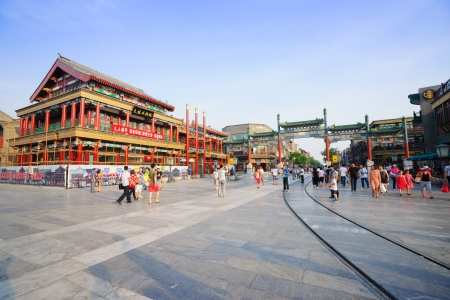 Beijing, China - May 28, 2012: Qianmen Street is a very busy ancient business street from hundreds of years ago,in Ming and Qing dynasty,Chinese people went here for recreational shopping.Even now,thousands of people from all around the world vist here foのeditorial素材
