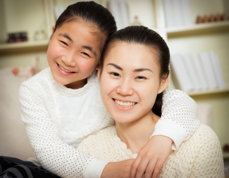 mother and daughter at homeの写真素材