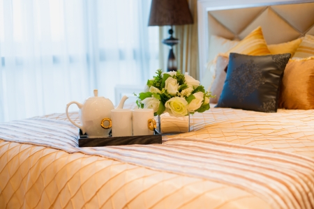 morning tea on a bedの写真素材
