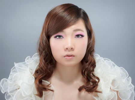 Chinese beauty with professional makeup in photography studioの写真素材