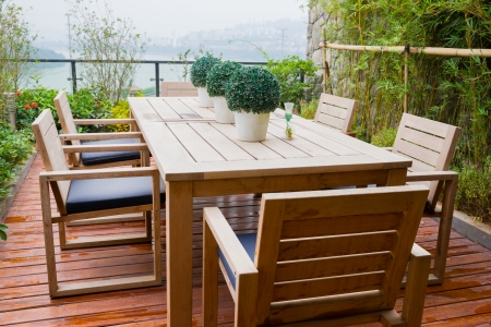 table and chairs on the house patioの写真素材
