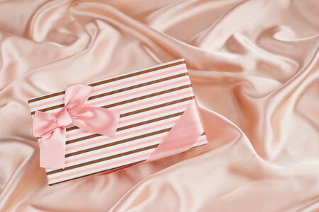 very nice gift box on silk clothの写真素材