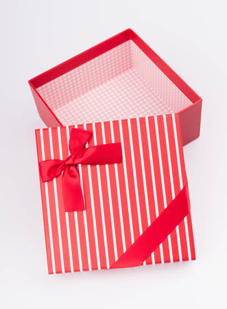 gift box with nice ribbon on white backgroundの写真素材