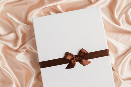 very nice gift box on silk clothの写真素材