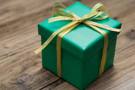 nice gift box on wood tableの写真素材