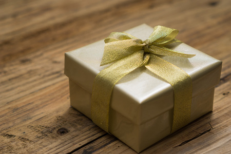 nice gift box on wood tableの写真素材